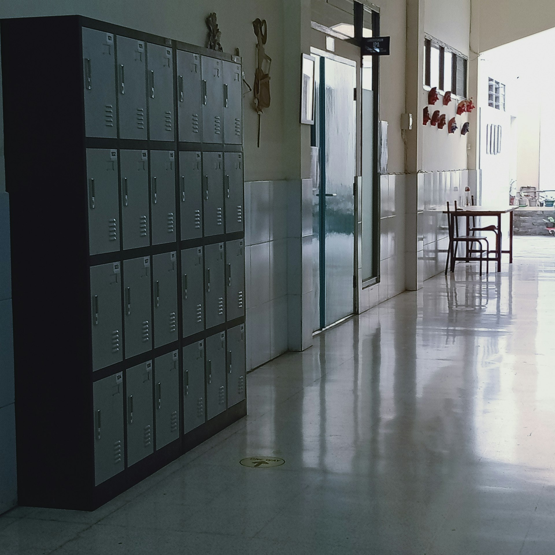 a hallway with blue cabinets